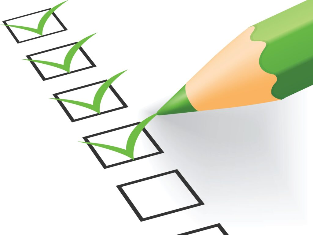 A green pencil checks off five boxes in a vertical list.