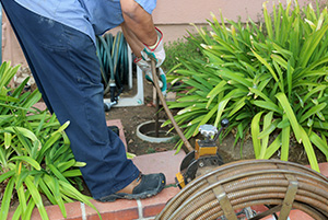 Plumber performing sewer line repair and cleaning services in cincinnati and northern kentucky
