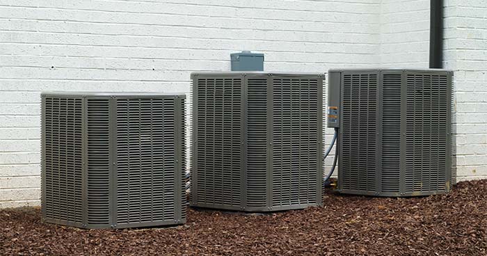 HELP hvac units on side of commercial building