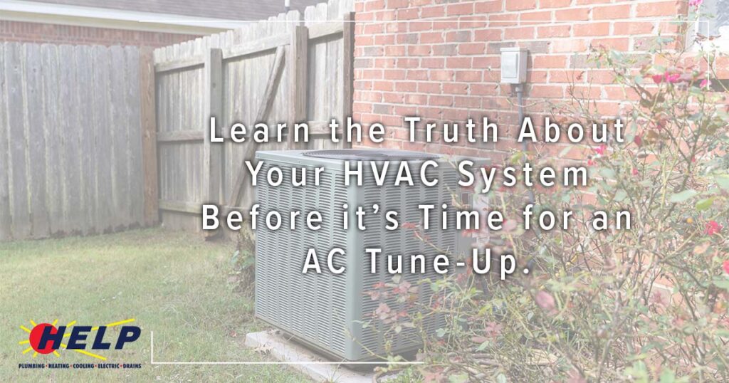 An outdoor HVAC unit by a brick home encourages HELP Plumbing, Heating, Cooling and Drains customers to learn about system care.