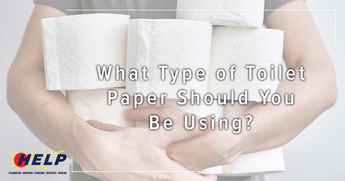 Image: a man holding many toilet paper rolls, cover image for What Type of Toilet Paper Should You Be Using?
