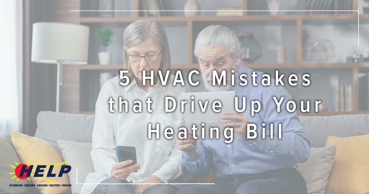Image: an older couple sitting on the couch looks over their bills, cover for5 HVAC Mistakes that Drive Up Your Heating Bill.